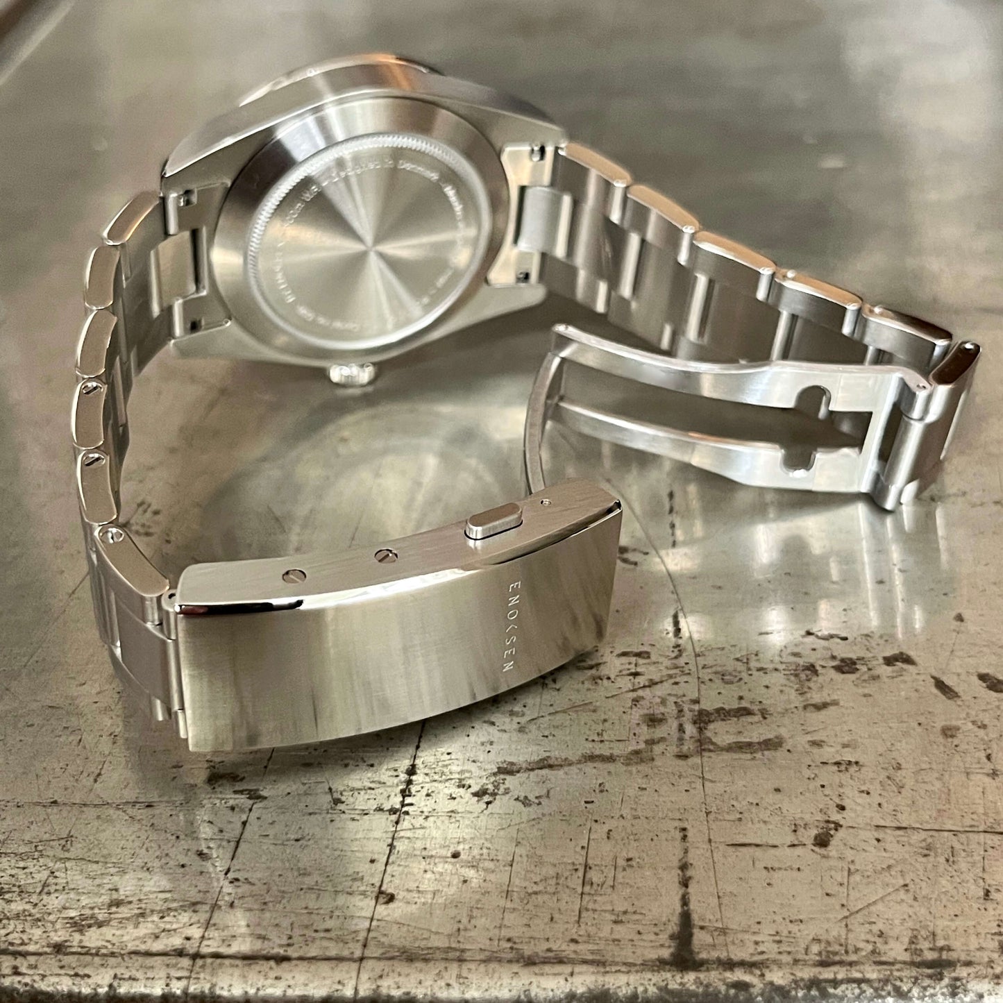 The Roam fitted with a solid steel bracelet - precision-milled, weighty in the right way, and complete with a quick-adjust clasp for the perfect fit in any setting.