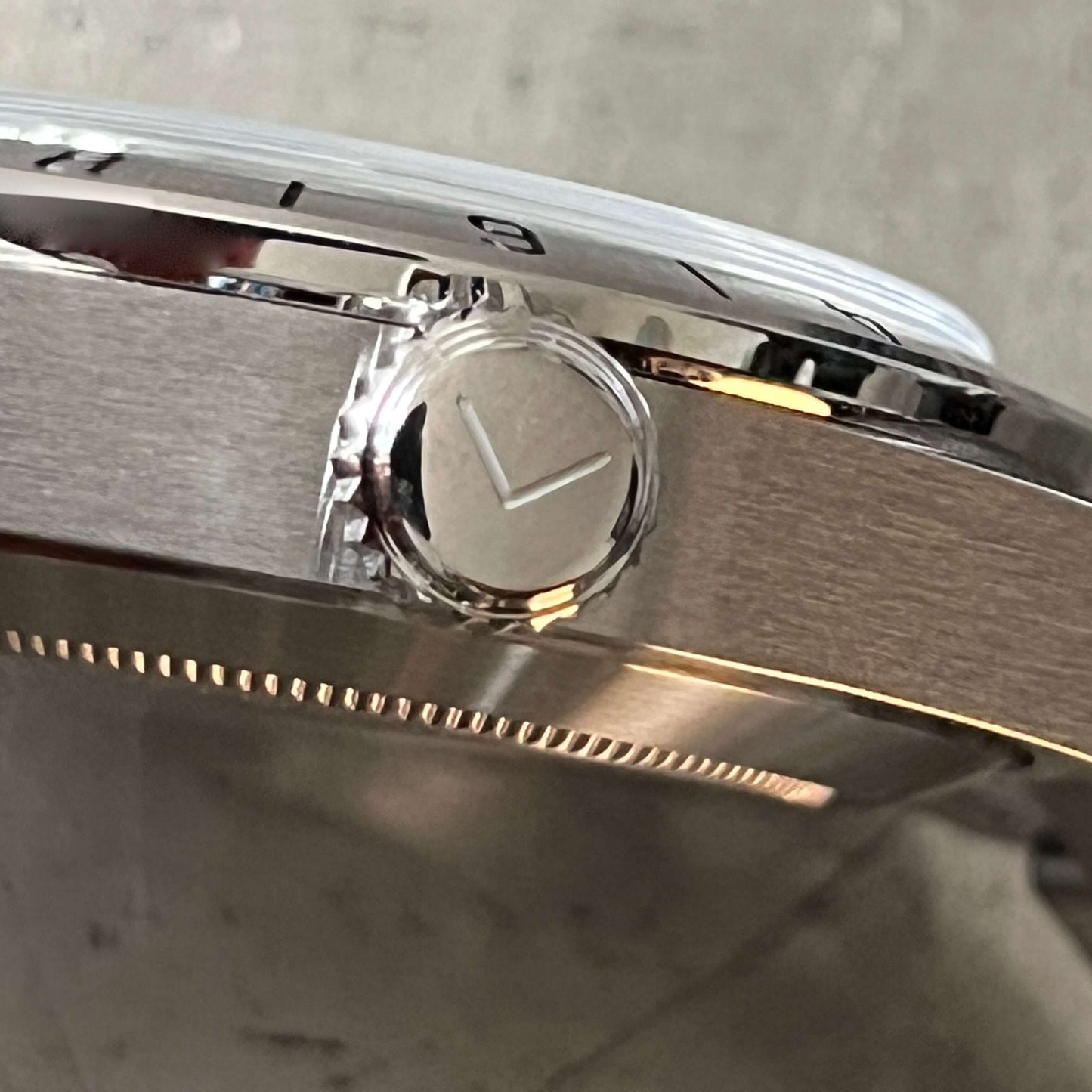 Close up of the solid steel crown featuring Enoksen logo.