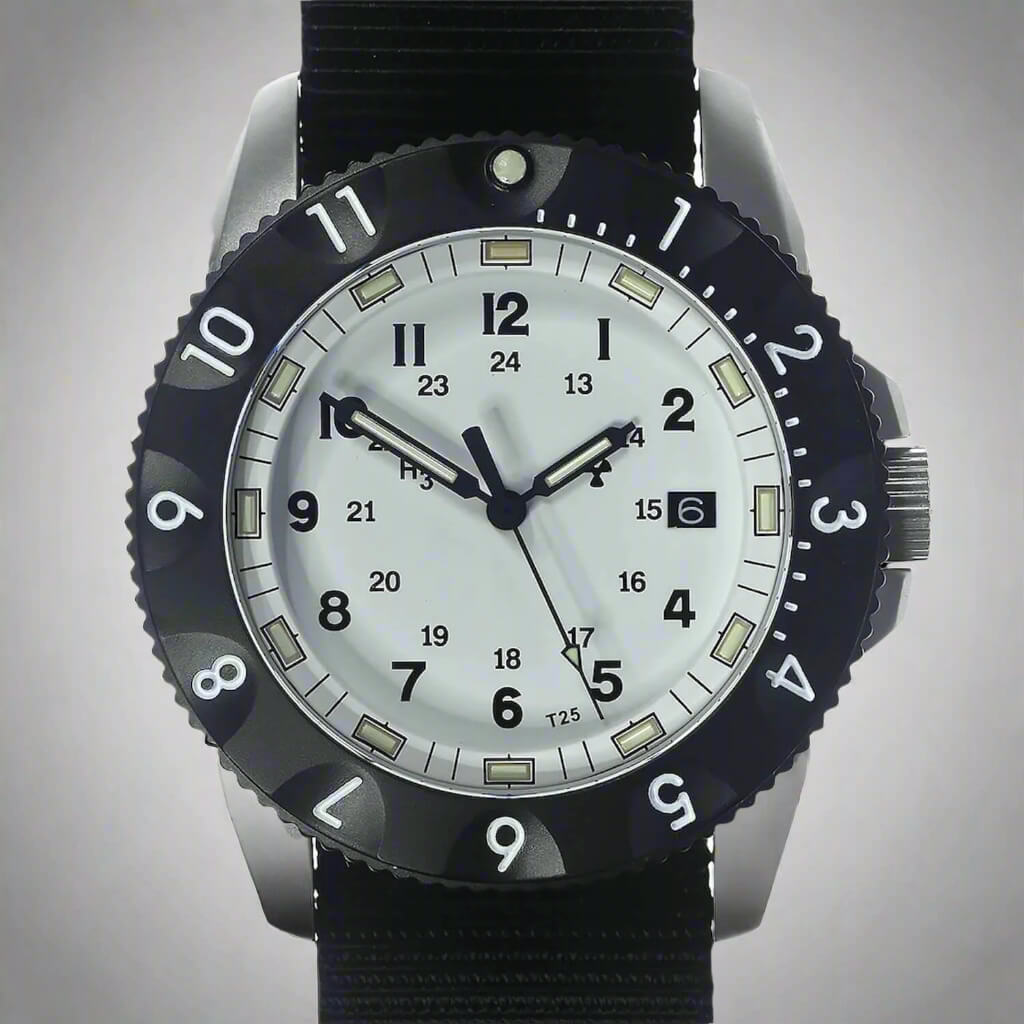 Close up of the high quality white dial, showcasing the Luminous markers and hands, plus a unidirectional rotating bezel with a luminous pip for dive timing.