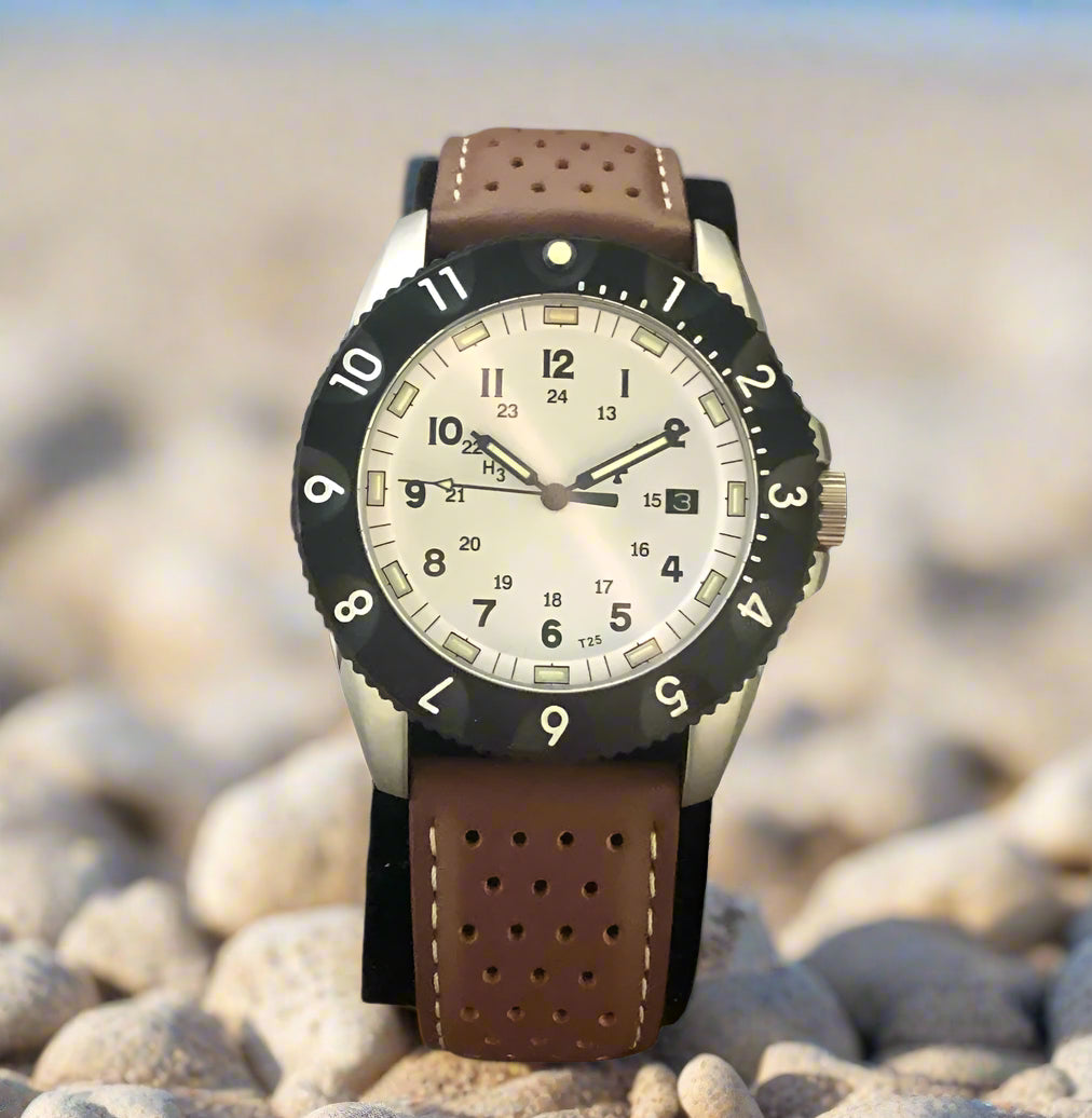 The tactical watch on a brown leather strap, showcasing the distinct elegant yet sporty look of the watch.