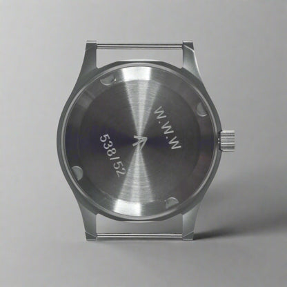 Aeschbach x Enoksen 'Fly' E03/T Dirty Dozen Automatic watch, 36mm, case back showing service number, broad arrow symbol, and WWW reference.