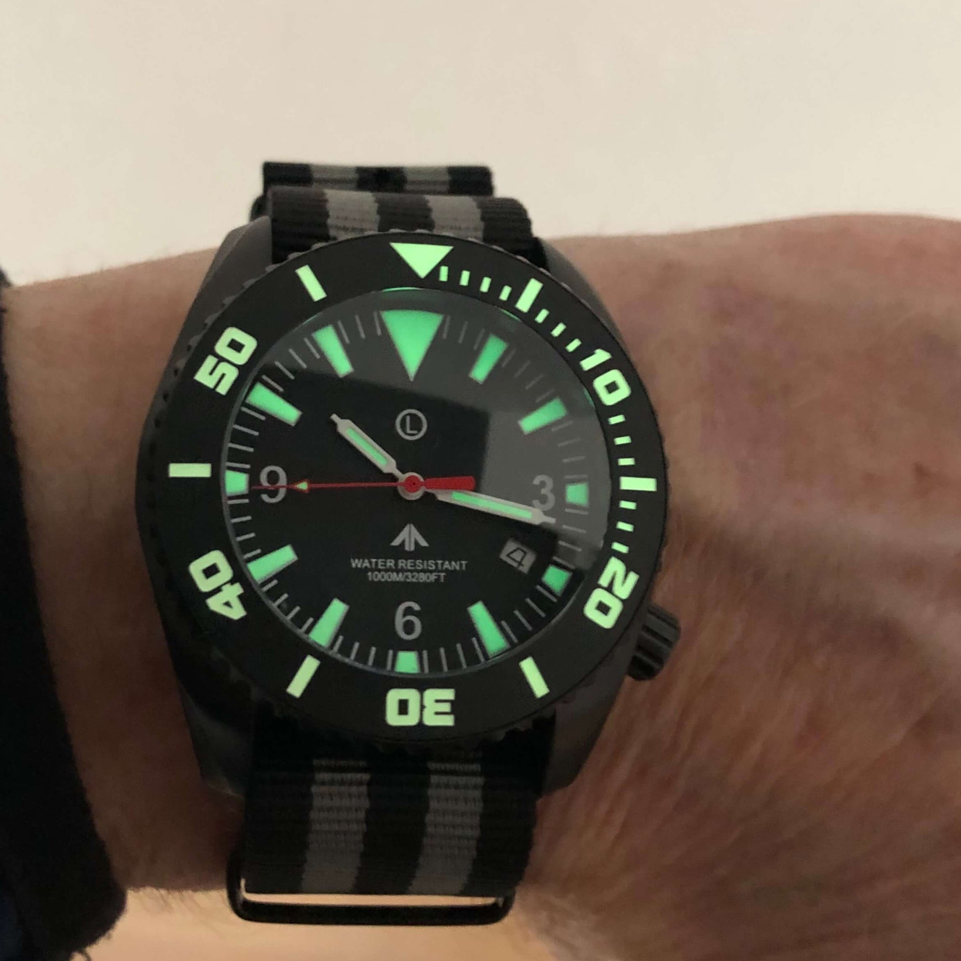 Deep Dive 1000m divers watch, black edition, 44mm, Super-Luminova, NATO strap, wrist shot 