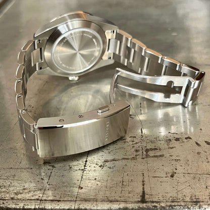The Roam fitted with a solid steel bracelet - precision-milled, weighty in the right way, and complete with a quick-adjust clasp for the perfect fit in any setting.