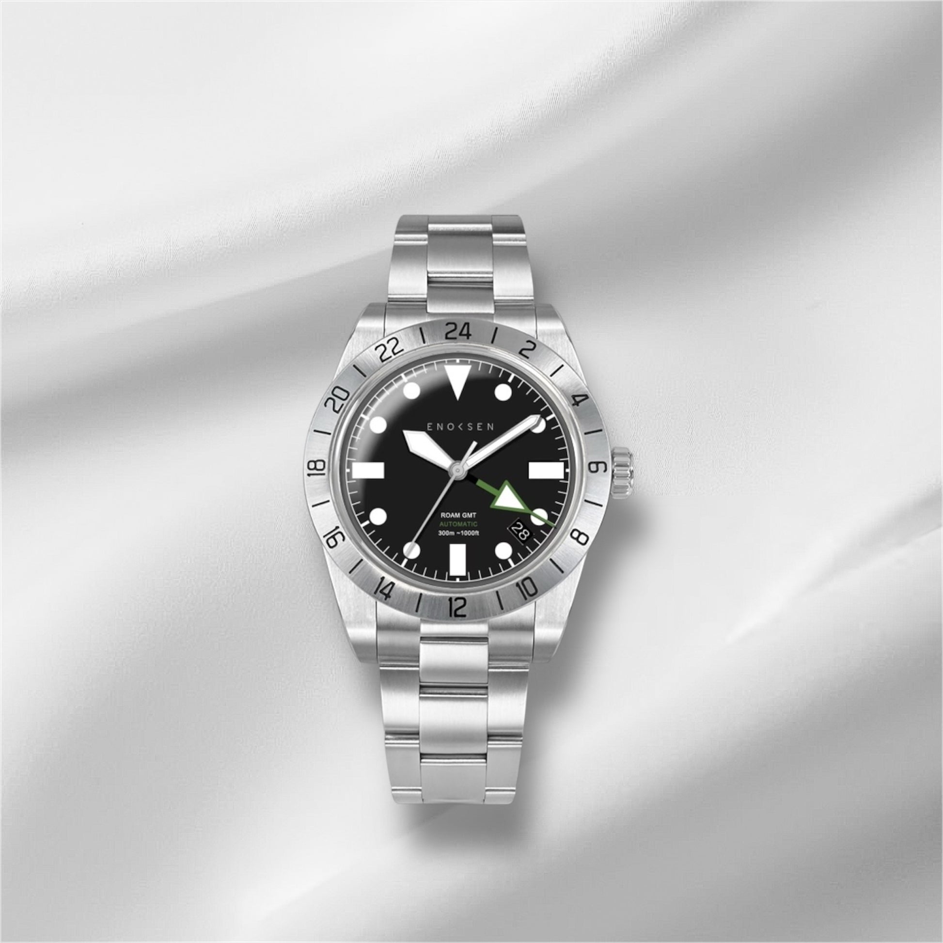 A slightly distant front view of the Roam E07/B watch. The image captures the watch's elegant design and emphasizes the crystal-clear sapphire glass.