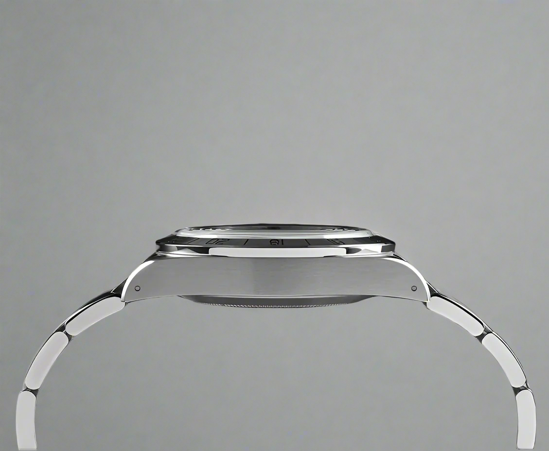 A side-on view showcasing the polished steel case of By Enoksen GMT watch. The image emphasizes the watch's elegant slim profile, and a durable sapphire crystal.