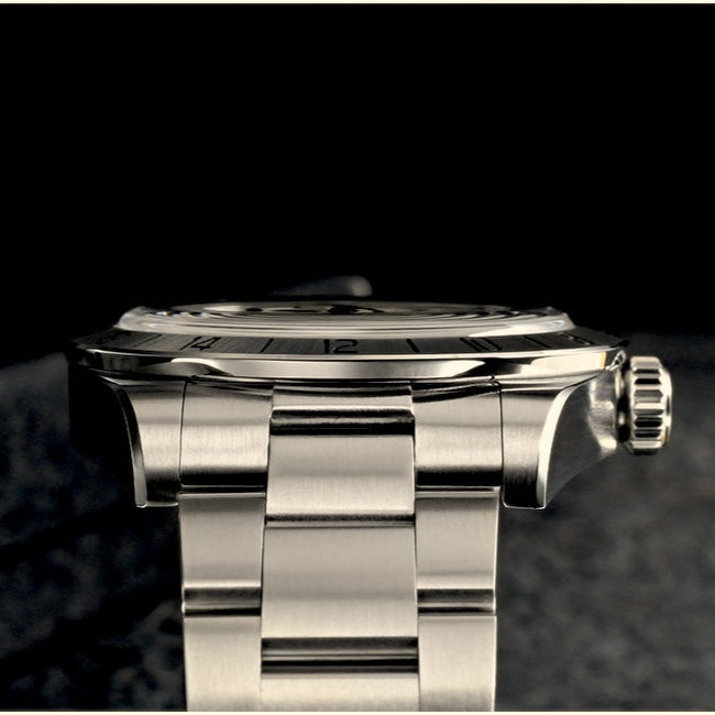 Side close-up view of the Roam E07/B, highlighting the silver link bracelet, showcasing the craftsmanship of By Enoksen.