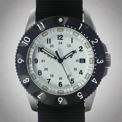 Close up of the high quality white dial, showcasing  the Luminous markers and hands, plus a unidirectional rotating bezel with a luminous pip for dive timing.