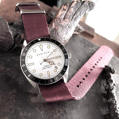 Dive II with white dial on burgundy herringbone woven strap, front view of dial.