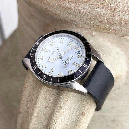 Dive II white dial edition on black rubber strap, angled view showing case profile and bezel.