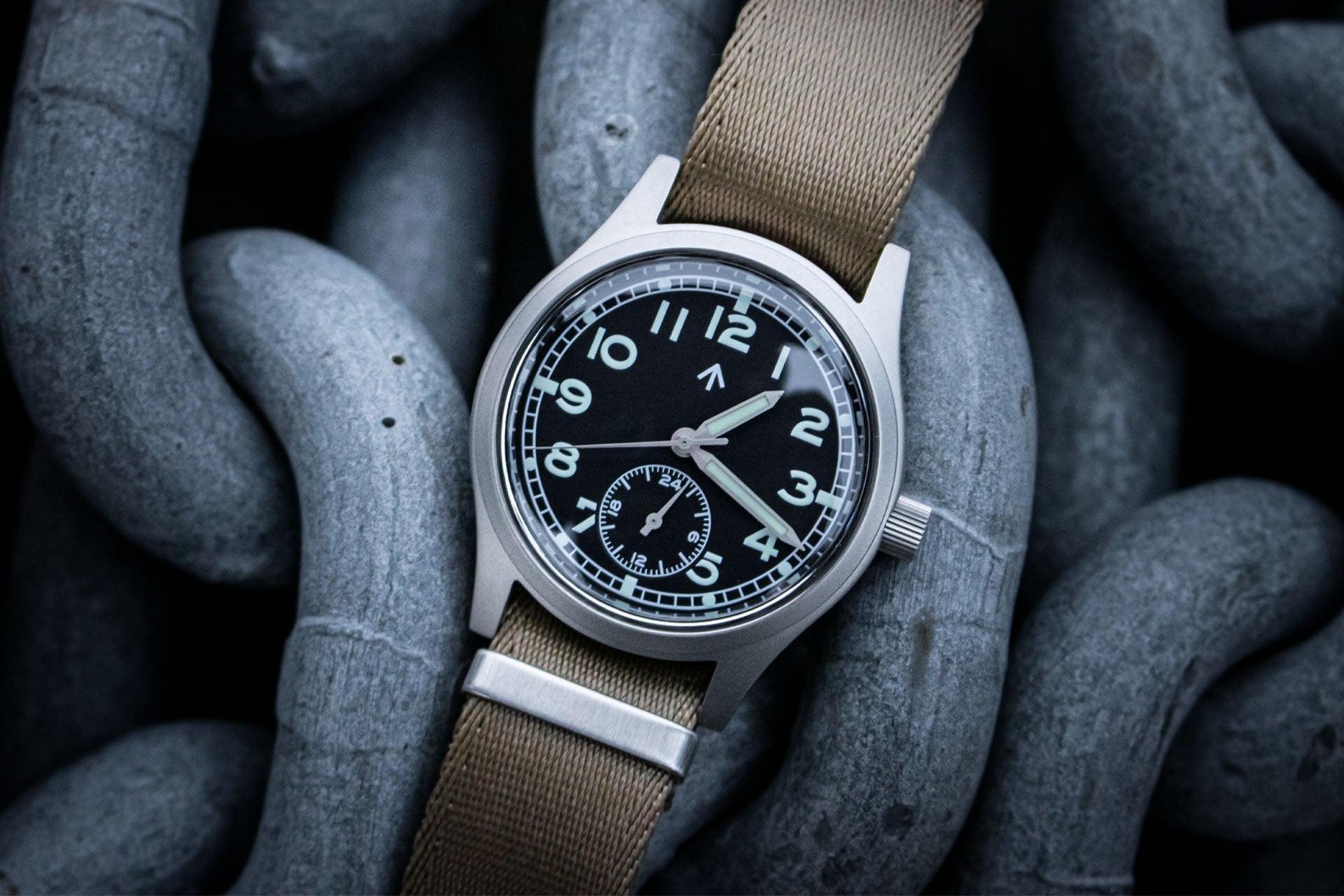 View of watch with khaki seatbelt